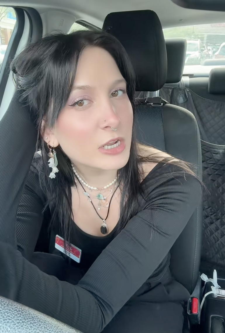 a woman sitting in a car